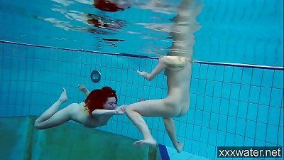 molten Russian women swimming in the pool